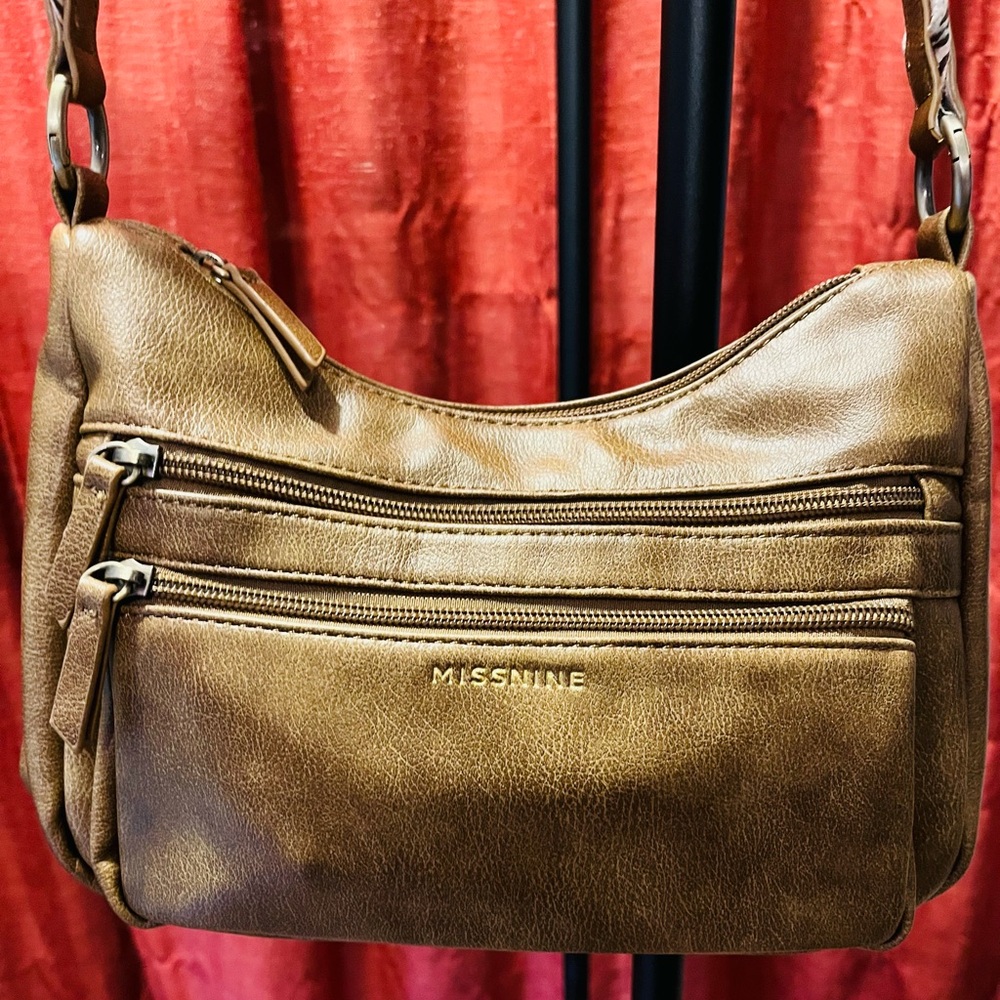 Missnine vegan leather crossbody bag with wide guitar strap